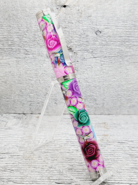 Shakespeare Rollerball Pen with a Polymer Clay Rainbow Floral and Hummingbird Body
